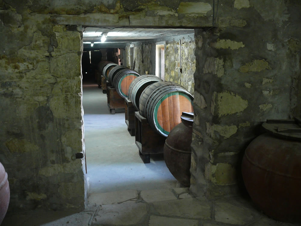Oak barrels in a stone-built museum